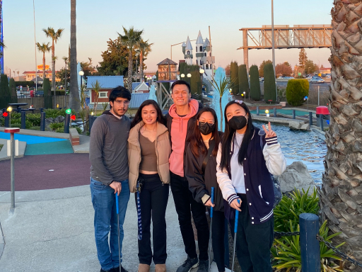 Some associates and I playing mini golf